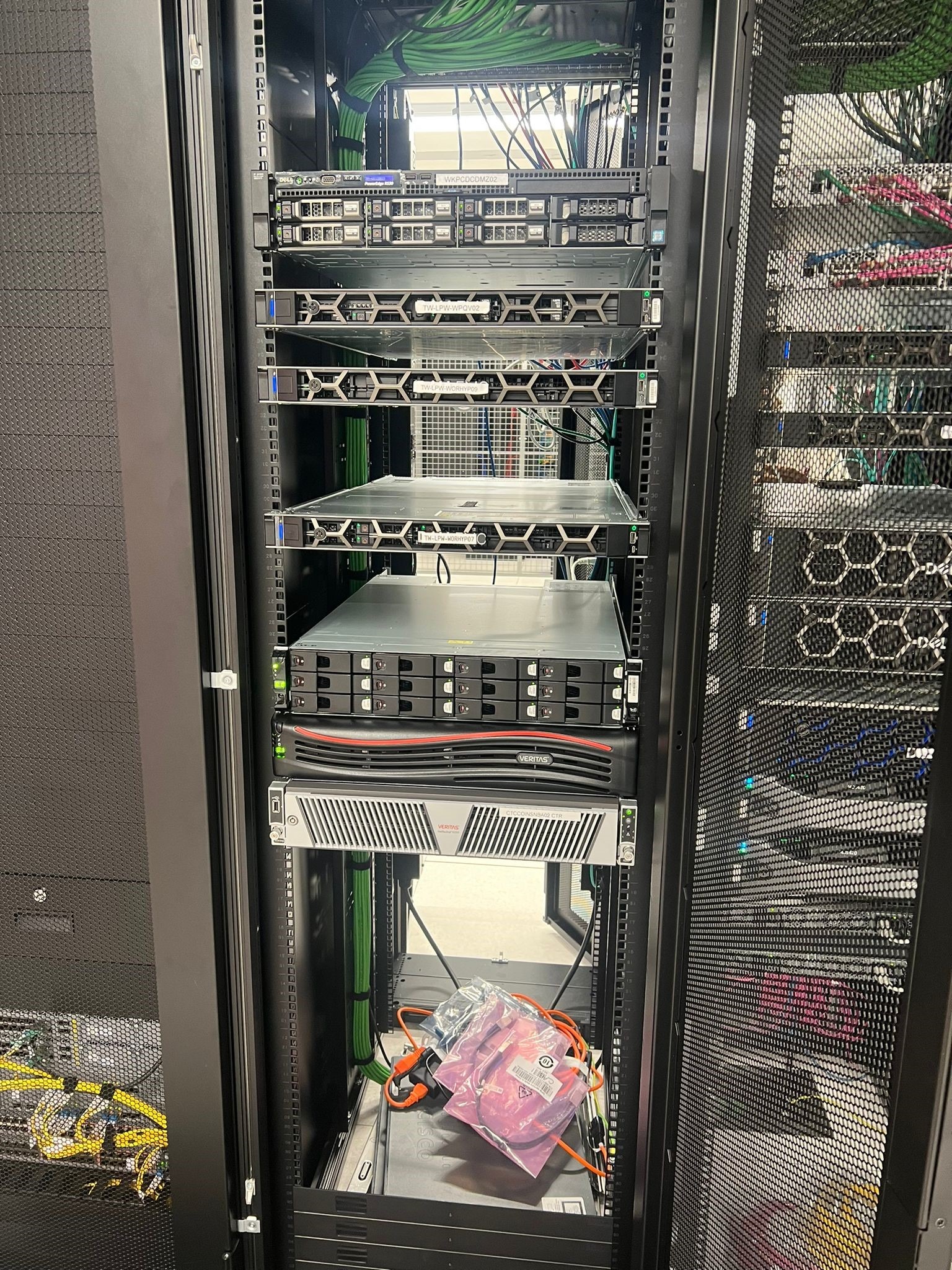 a computer server with many wires and cables